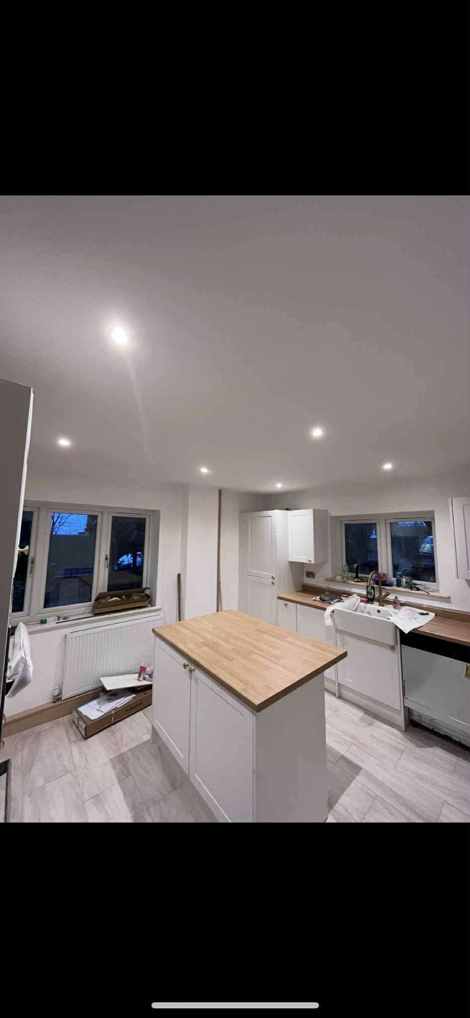 Ceiling lights fitted flush into a kitchen